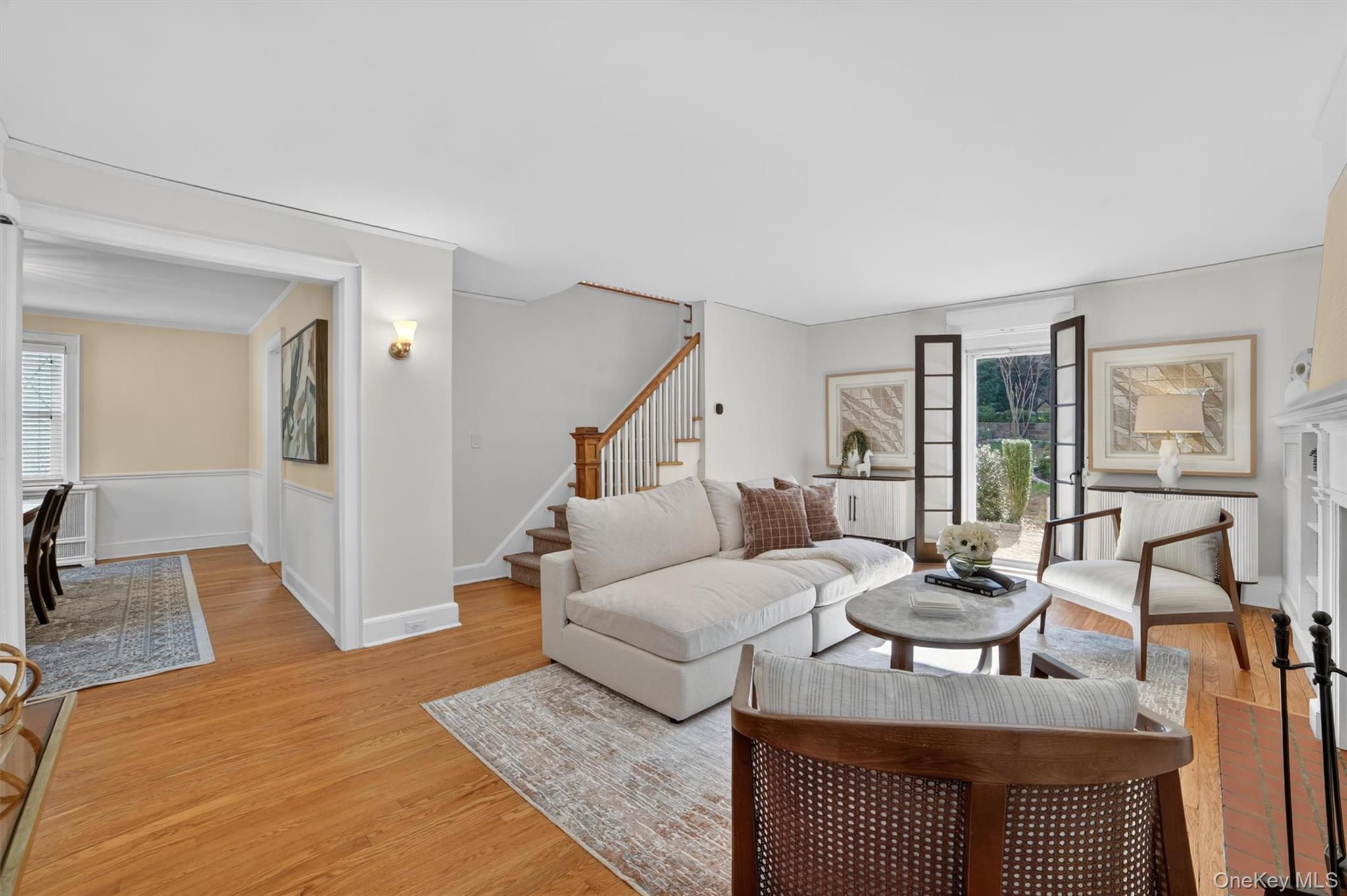 404 Bronxville Road Bronxville, NY 10708 - Photo 10 of 43 a living room with furniture and a table