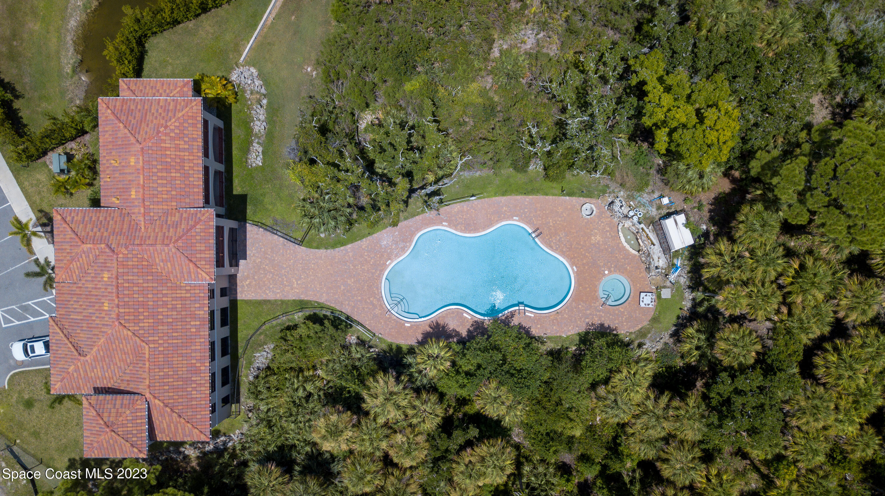 735 Pilot Lane, Unit 313 Merritt Island, FL 32952 - Photo 17 of 20 an aerial view of a house with yard swimming pool and outdoor seating
