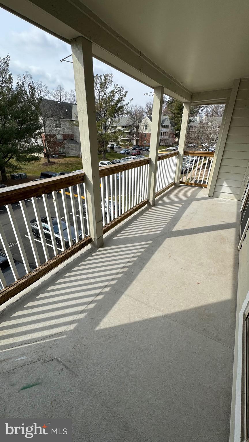 12151 Penderview Lane, Unit 2038 Fairfax, VA 22033 - Photo 13 of 18 a view of balcony with furniture