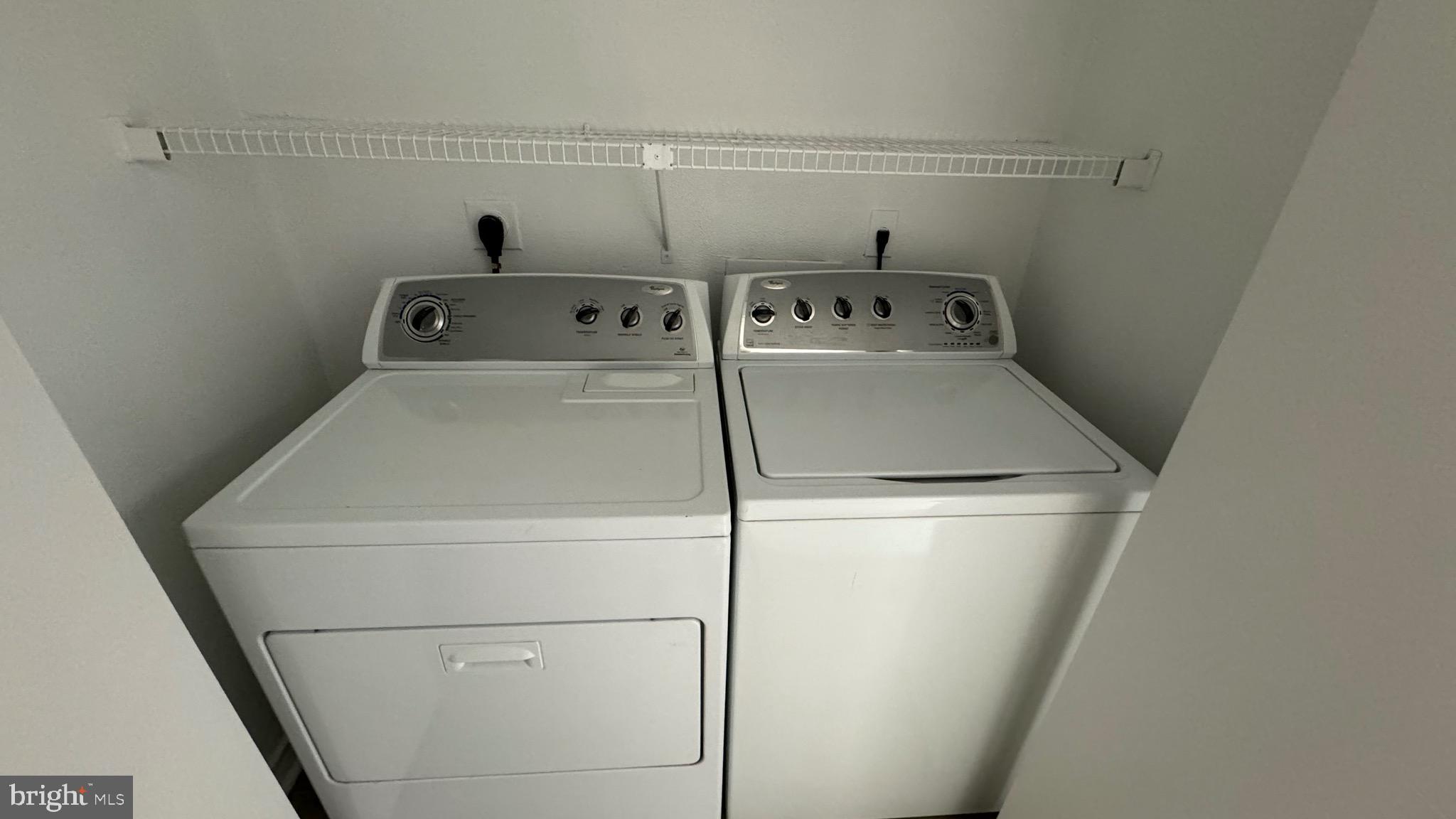 12151 Penderview Lane, Unit 2038 Fairfax, VA 22033 - Photo 14 of 18 a utility room with dryer and washer
