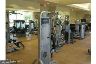 12151 Penderview Lane, Unit 2038 Fairfax, VA 22033 - Photo 18 of 18 a view of a room with gym equipment