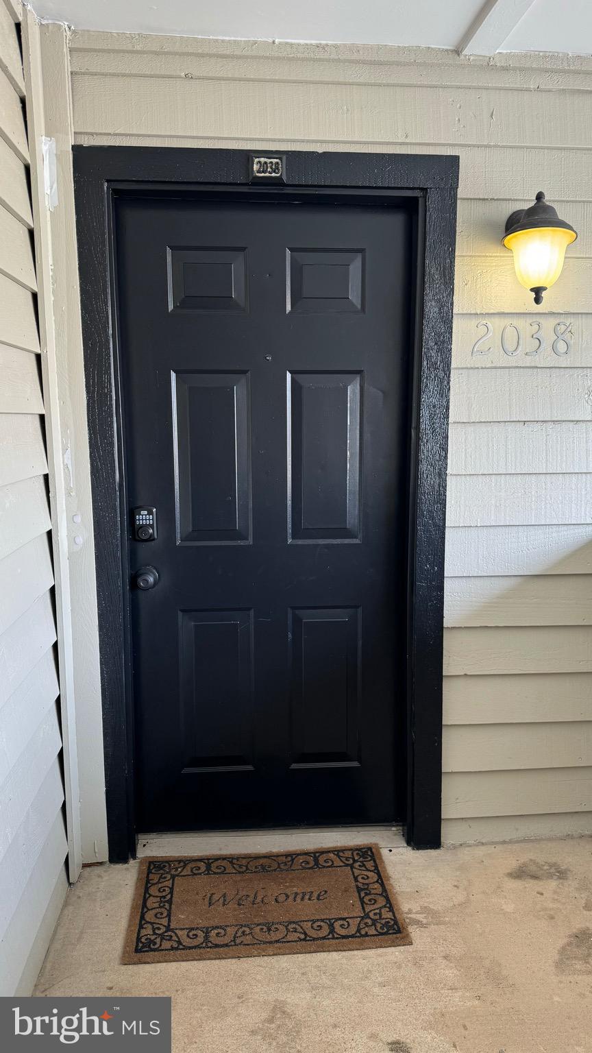 12151 Penderview Lane, Unit 2038 Fairfax, VA 22033 - Photo 3 of 18 a view of a door of the house