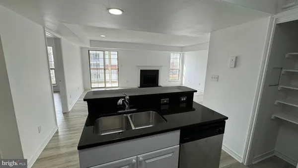 a view of a kitchen area with furniture and window