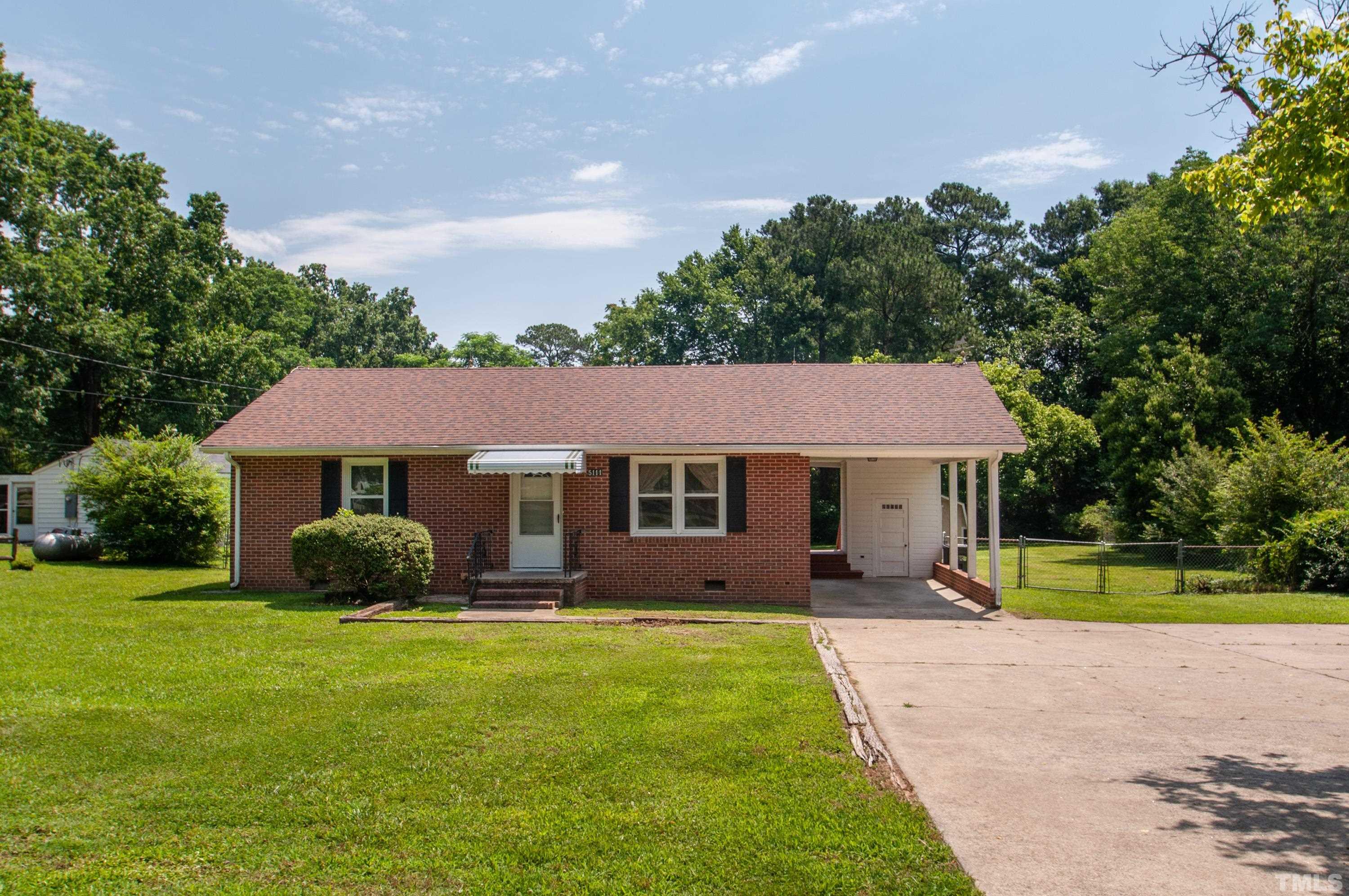 5111 Old Stage Road Raleigh, NC 27603 - Photo 1 of 29 a front view of house with yard and green space