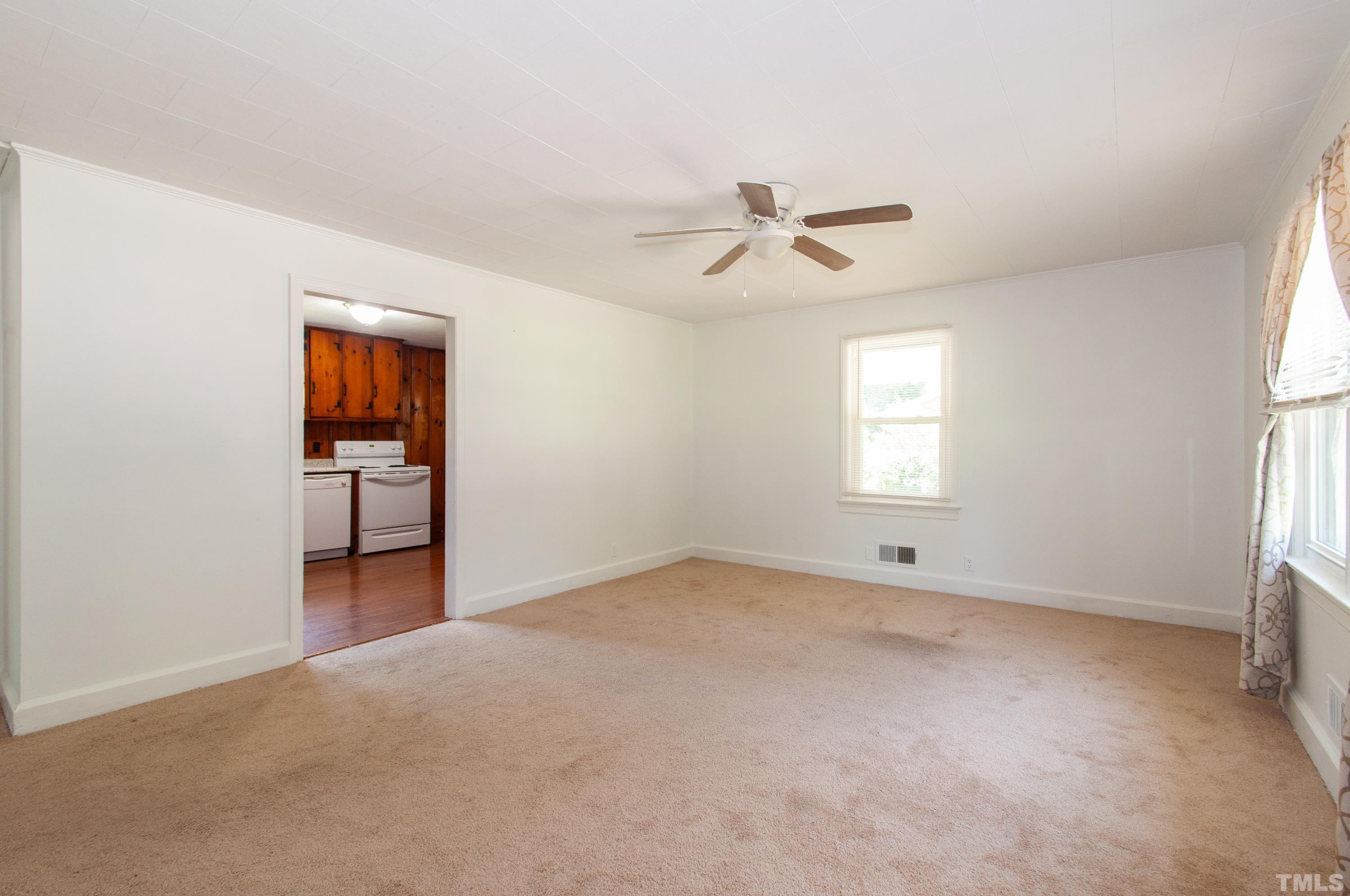 5111 Old Stage Road Raleigh, NC 27603 - Photo 12 of 29 a view of an empty room with a window