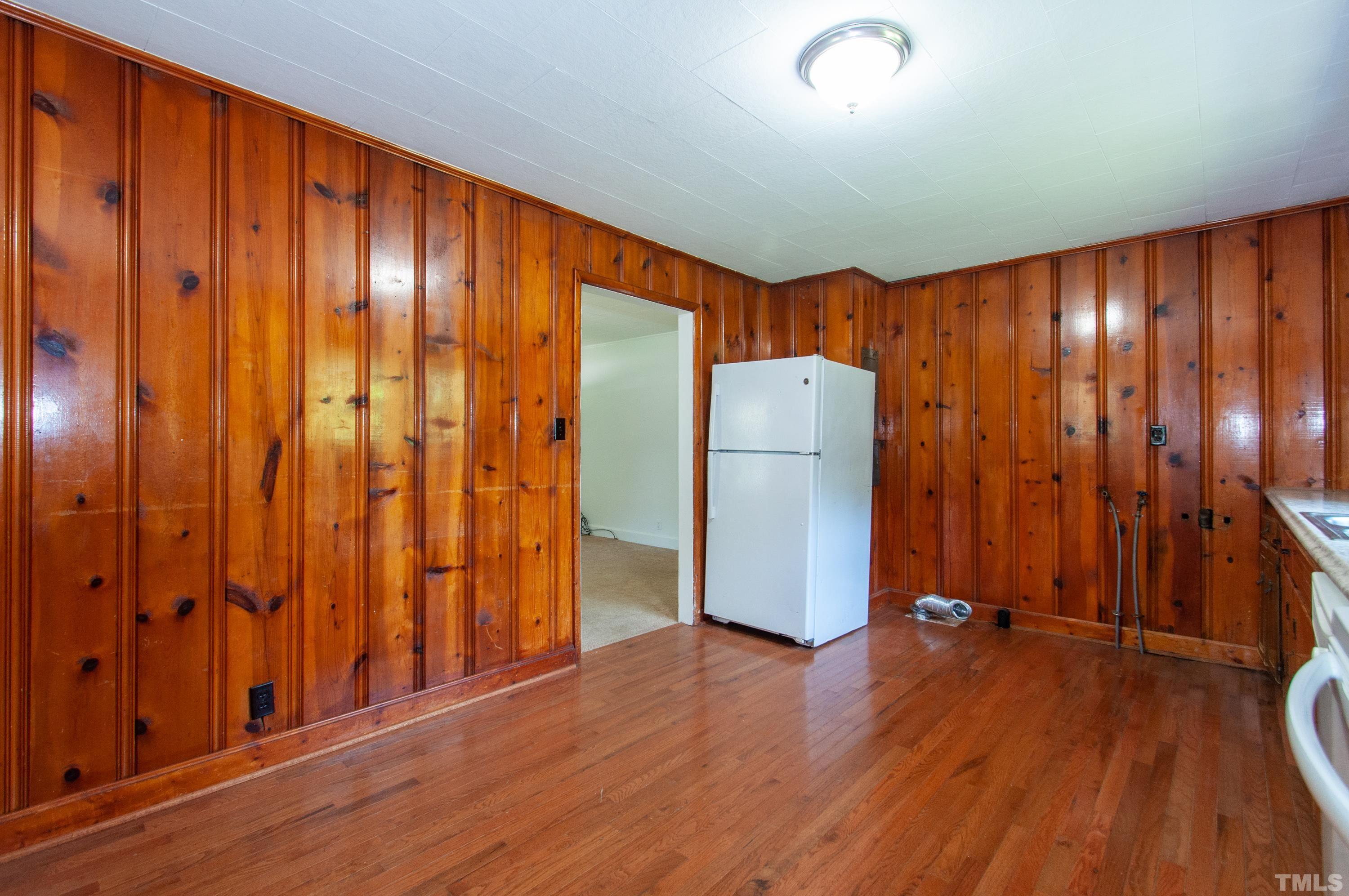 5111 Old Stage Road Raleigh, NC 27603 - Photo 15 of 29 an empty room with wooden floor and a window
