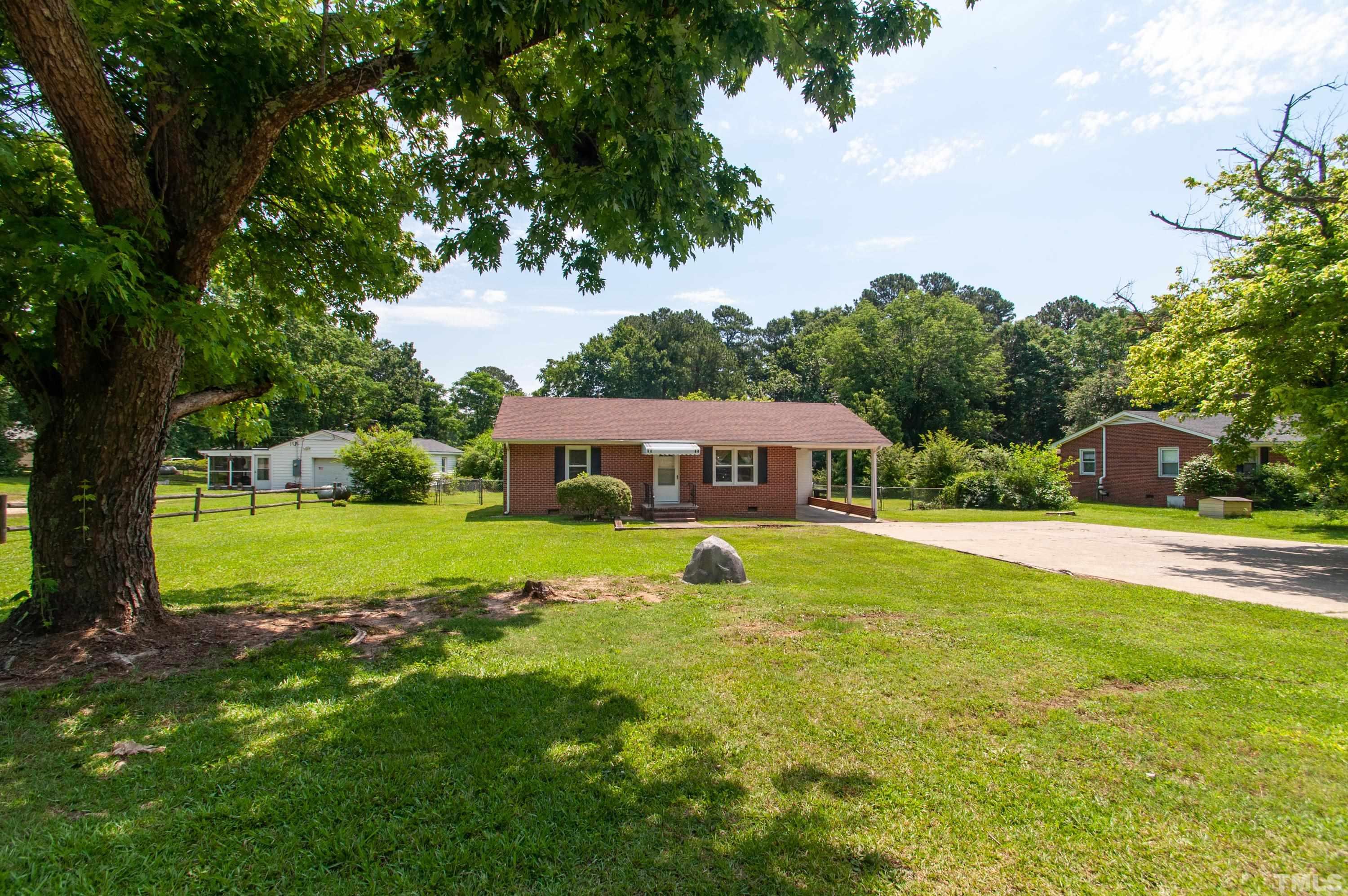 5111 Old Stage Road Raleigh, NC 27603 - Photo 7 of 29 a view of a house with swimming pool and yard