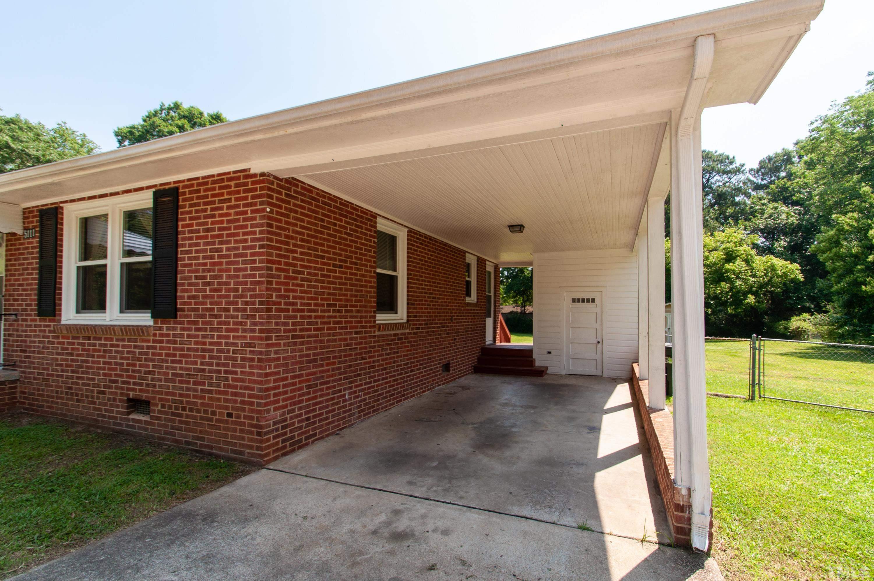 5111 Old Stage Road Raleigh, NC 27603 - Photo 8 of 29 a view of a house with backyard