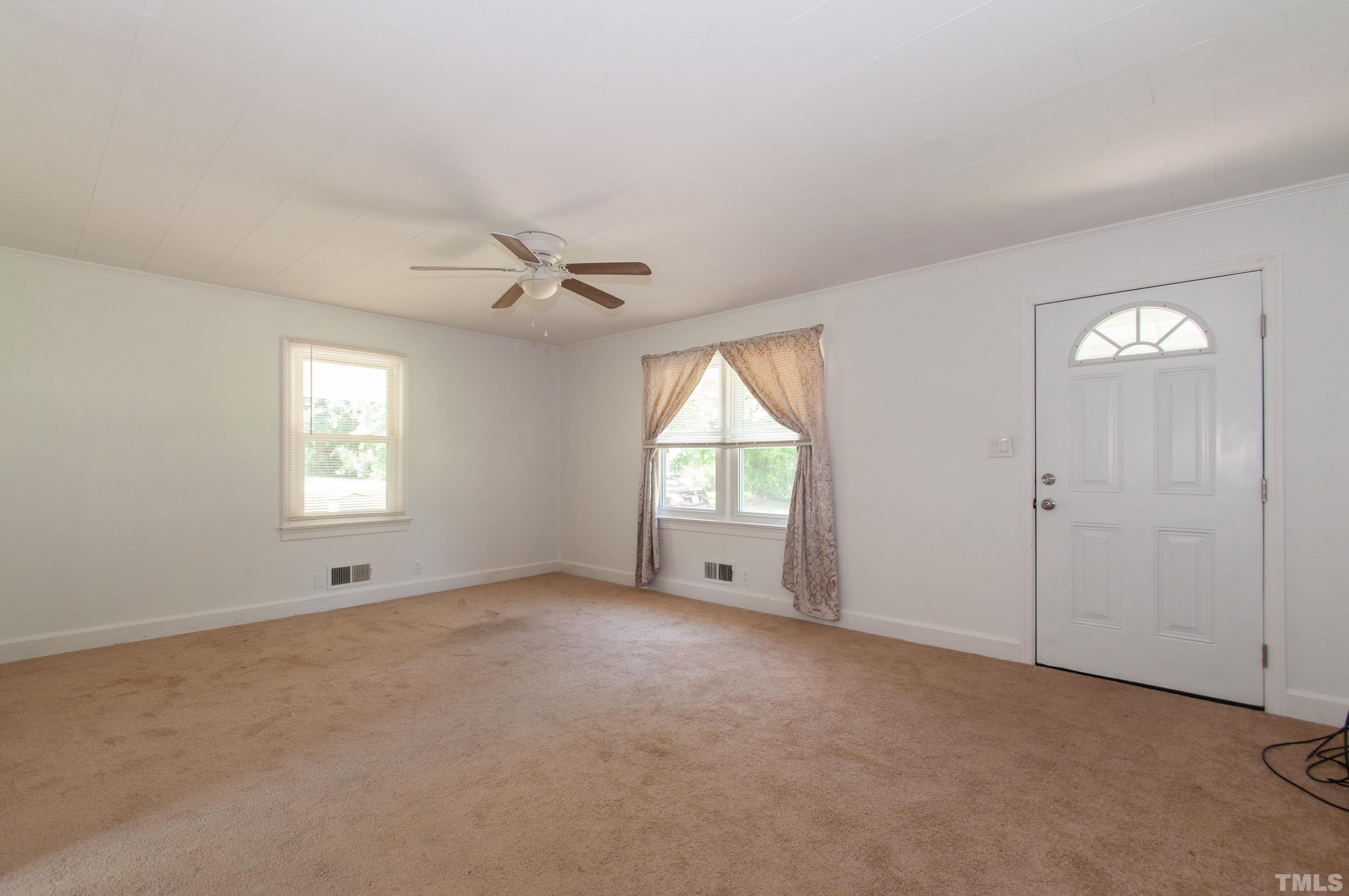 5111 Old Stage Road Raleigh, NC 27603 - Photo 9 of 29 a view of an empty room with a window