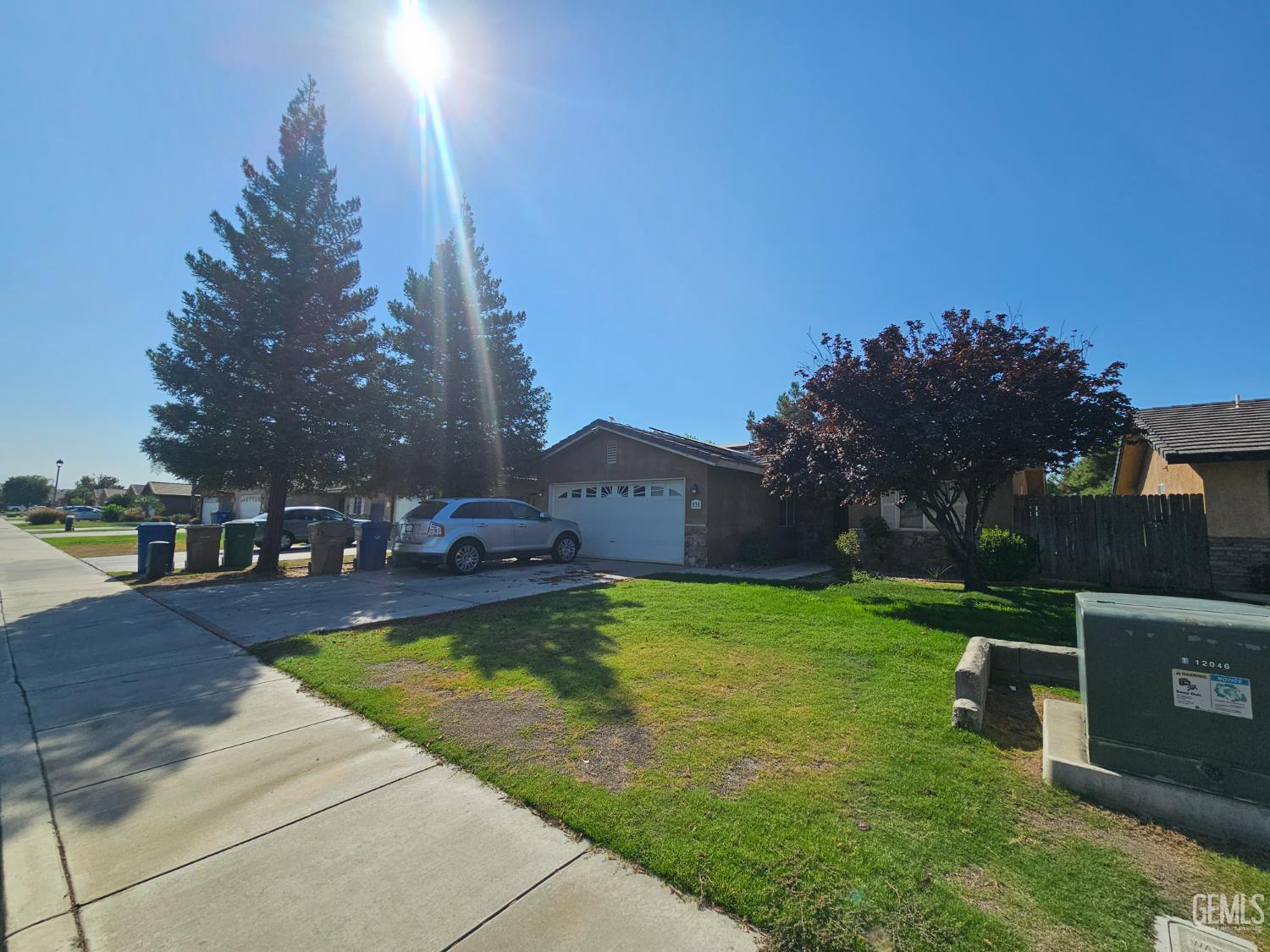 Undisclosed Address Bakersfield, CA 93308 - Photo 1 of 11 a swimming pool with outdoor seating and yard