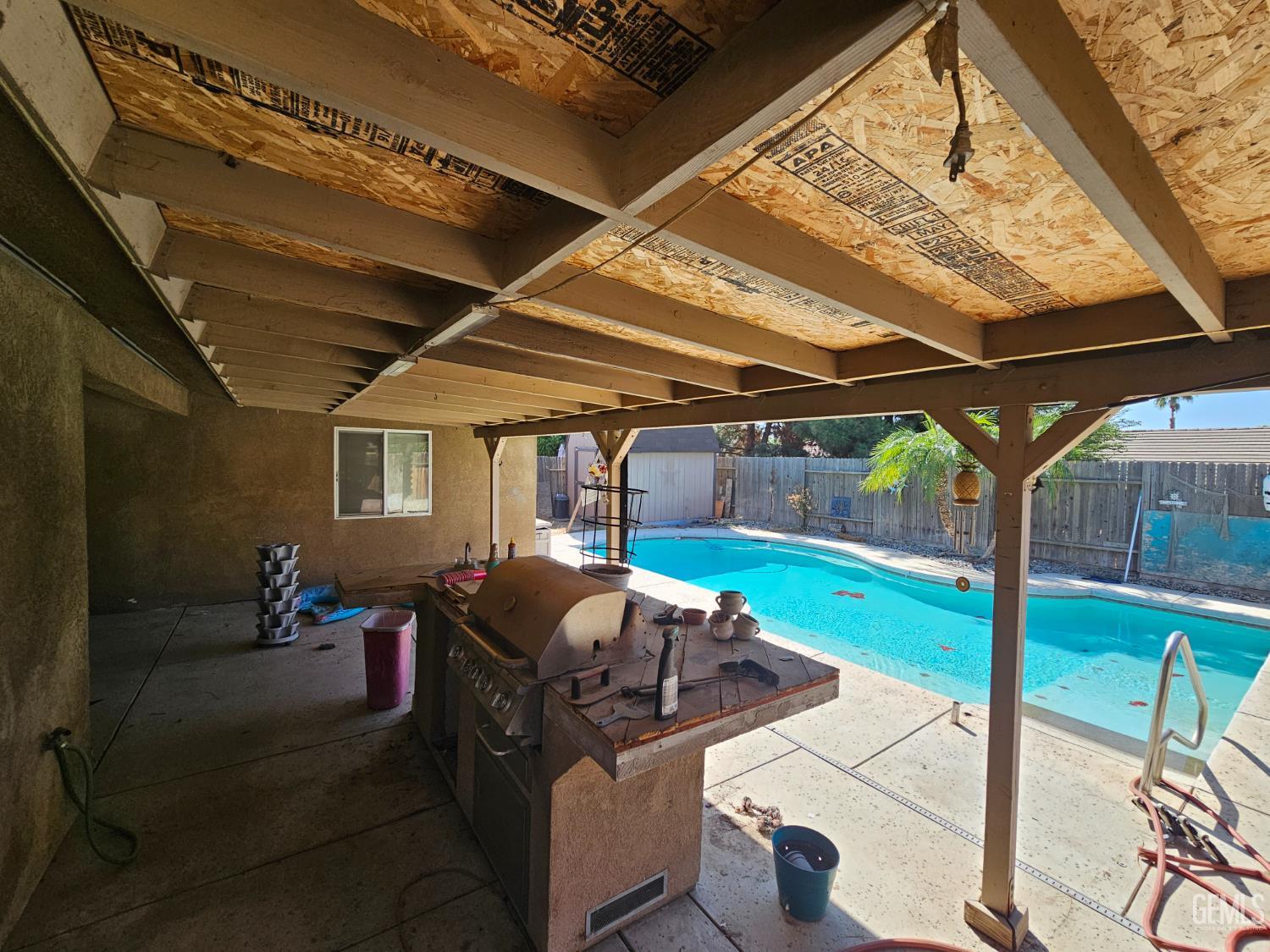 Undisclosed Address Bakersfield, CA 93308 - Photo 9 of 11 a patio with table and chairs