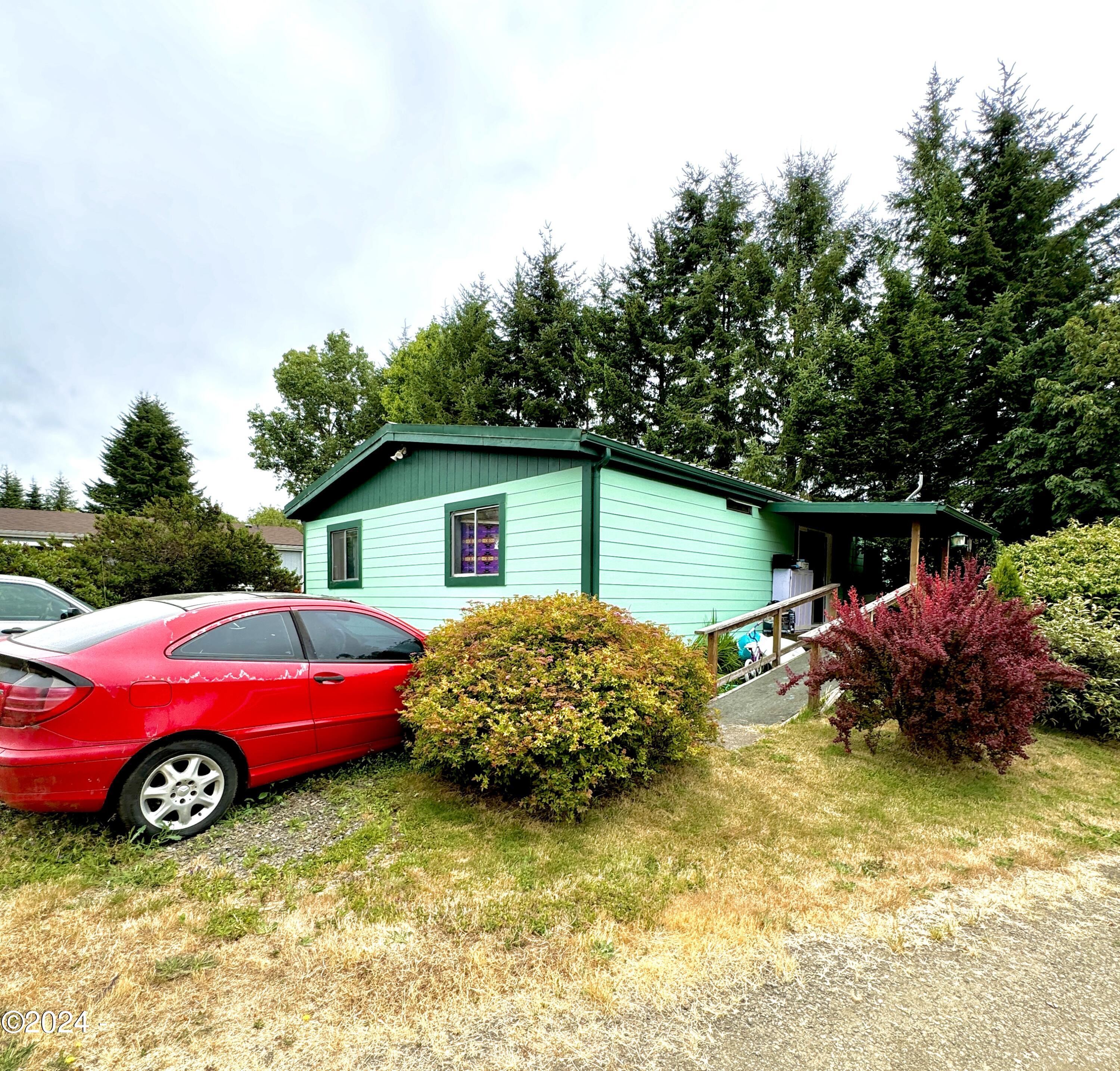 724 Southwest Ferry Avenue, Unit 73 Siletz, OR 97380 - Photo 3 of 24 Exterior