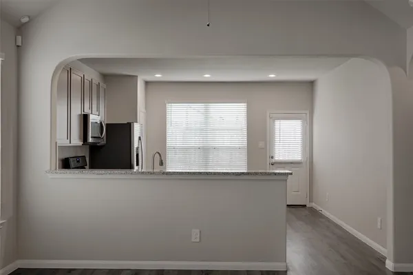 a view of a living room and a window