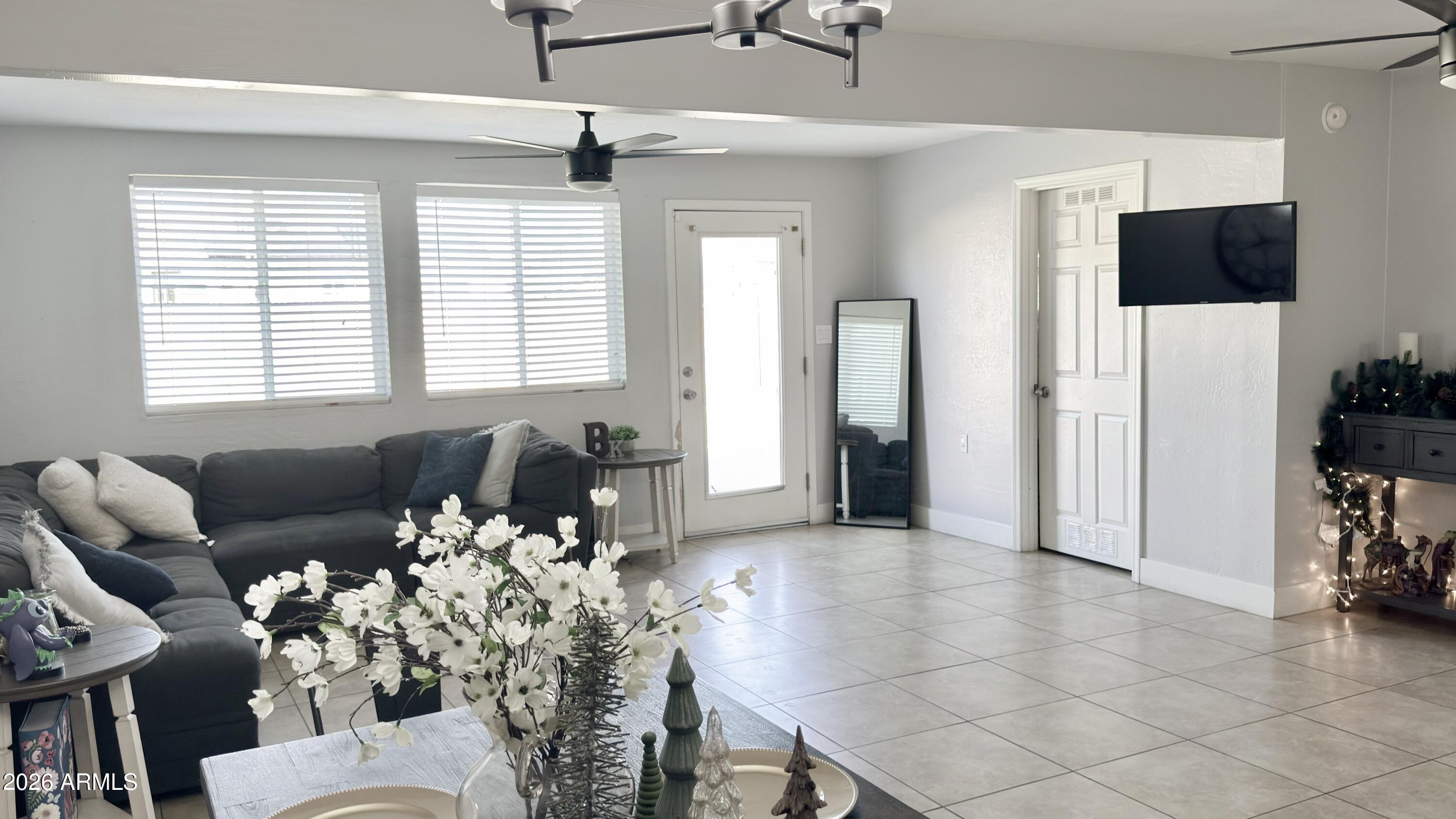 480 West Harrison Street Chandler, AZ 85225 - Photo 11 of 28 a living room with furniture and a flat screen tv