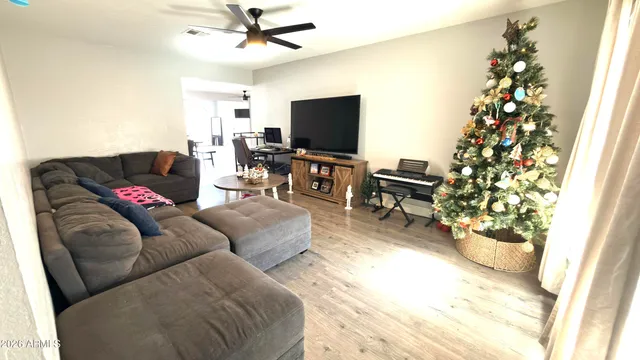 a bedroom with a bed and flat screen tv