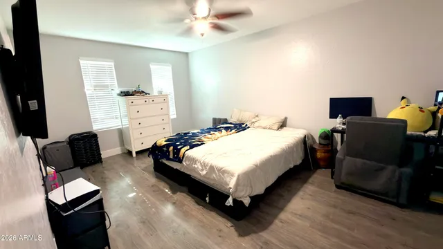 a bathroom with a shower and a toilet