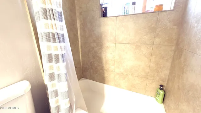 a room with furniture and a wooden floor