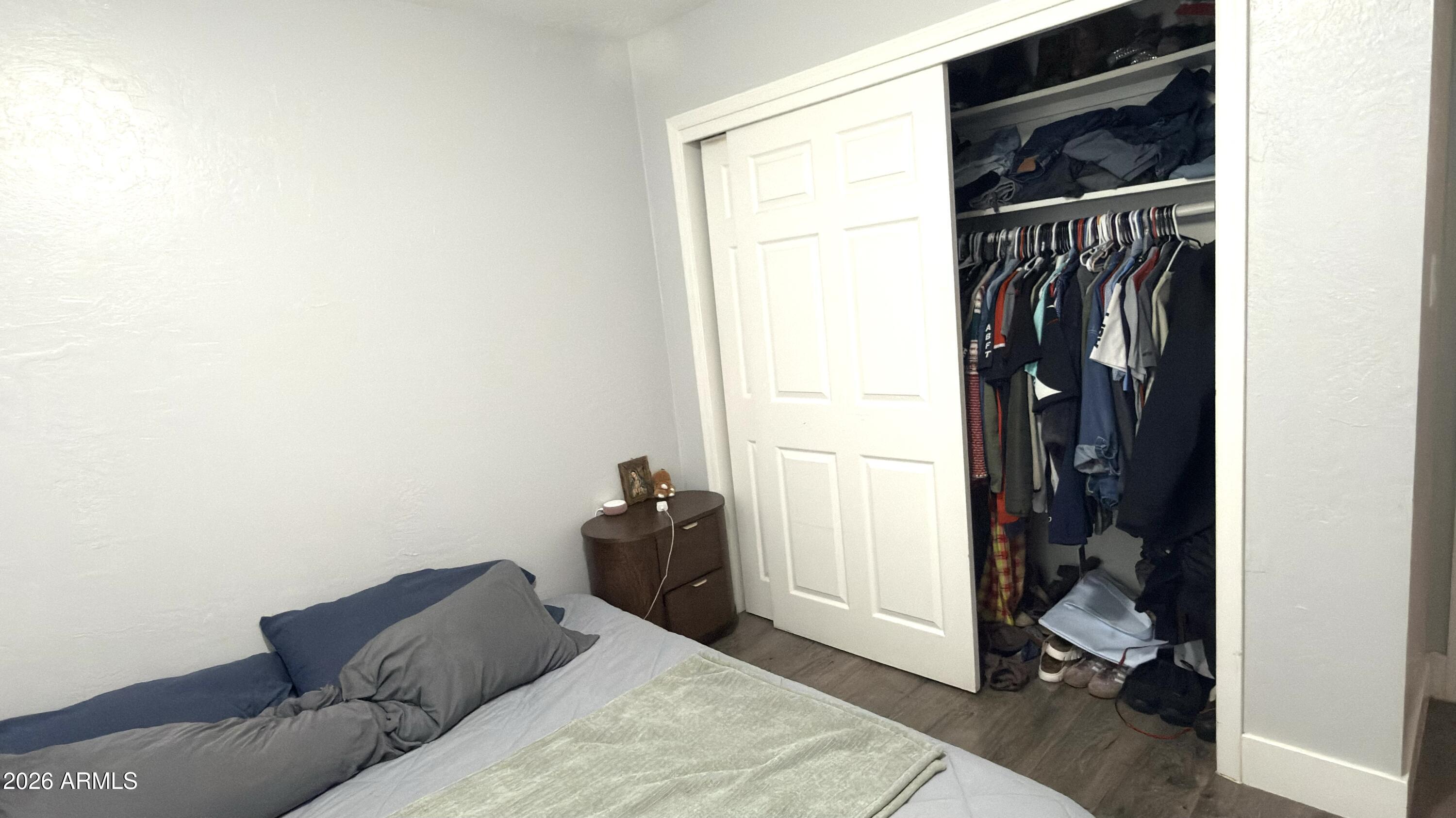 480 West Harrison Street Chandler, AZ 85225 - Photo 21 of 28 a bedroom with a bed and a window