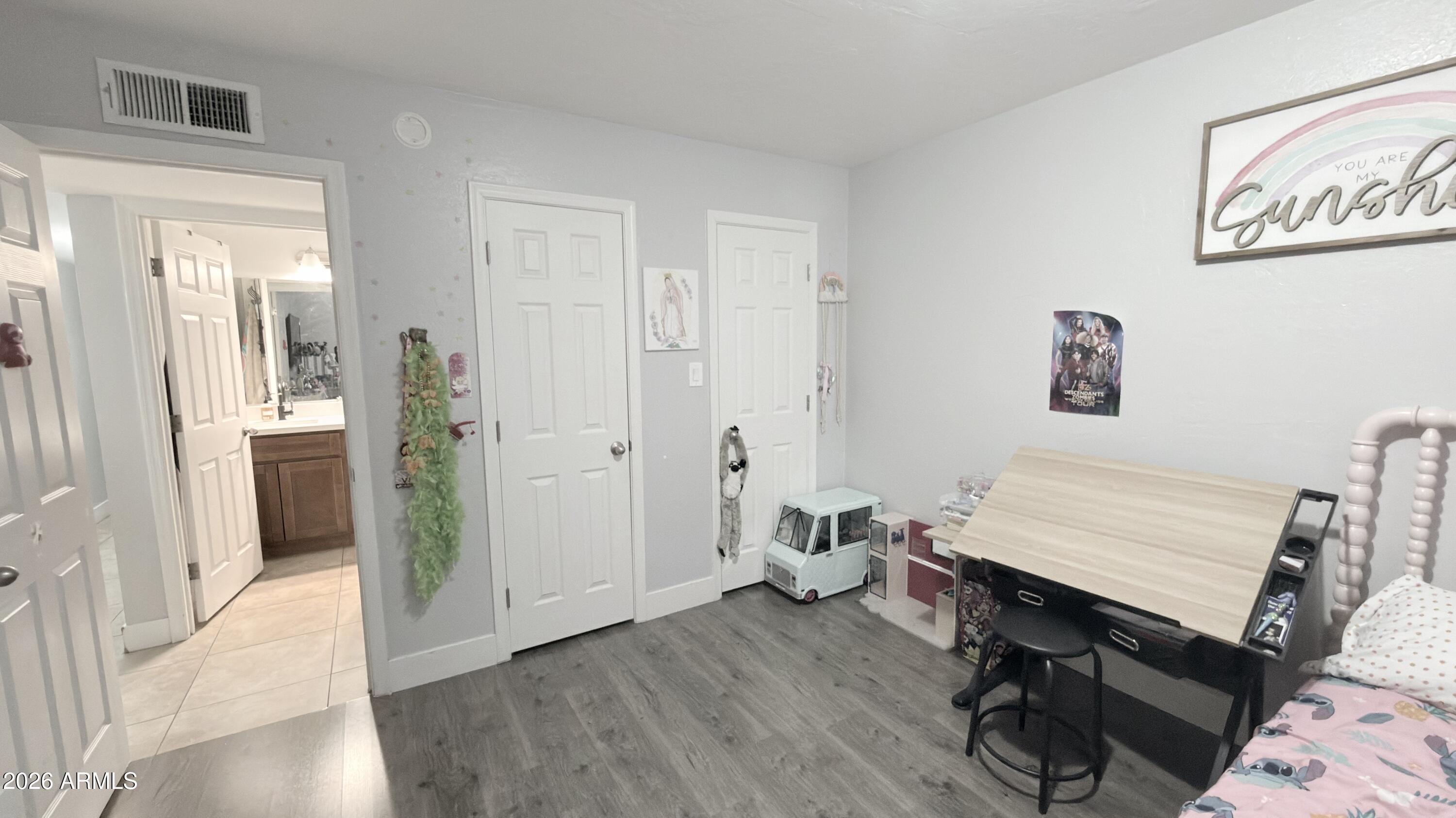 480 West Harrison Street Chandler, AZ 85225 - Photo 27 of 28 a room with a table and a workspace