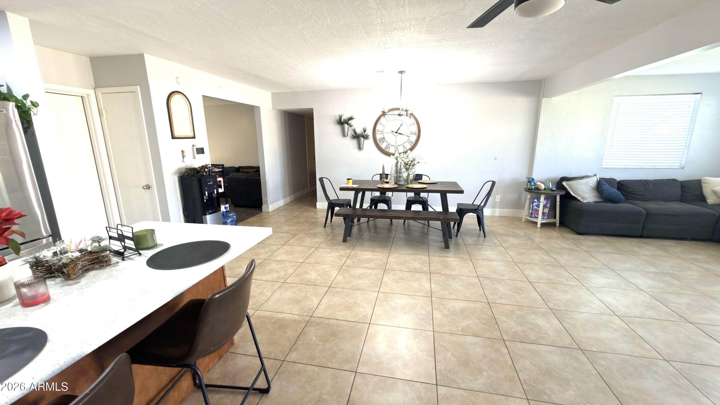 480 West Harrison Street Chandler, AZ 85225 - Photo 9 of 28 a living room with furniture and a mirror