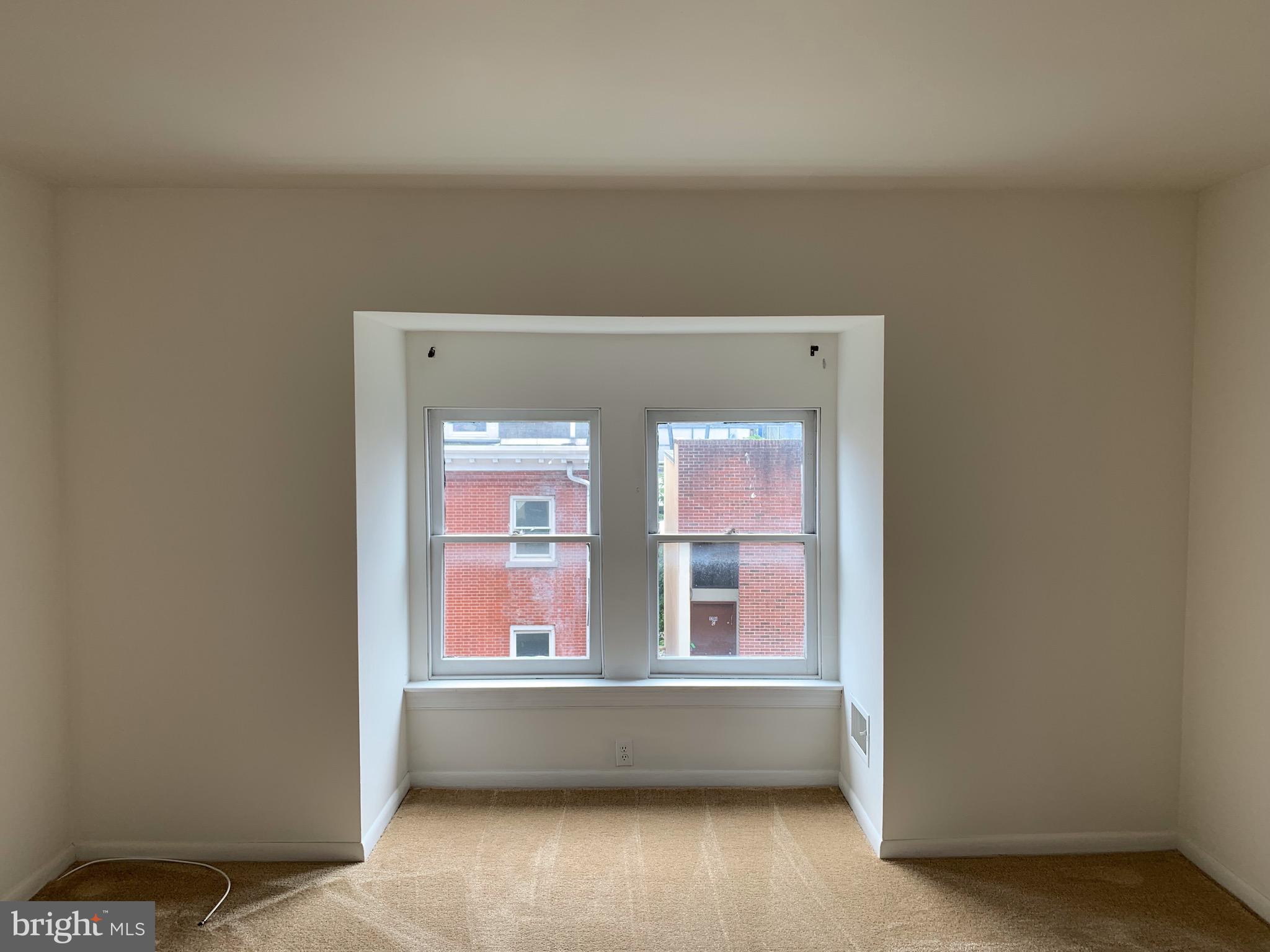 1207 Locust Street, Unit 2F Philadelphia, PA 19107 - Photo 16 of 19 a view of room with window