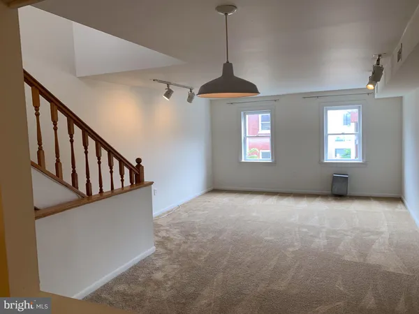 a view of an entryway with a window