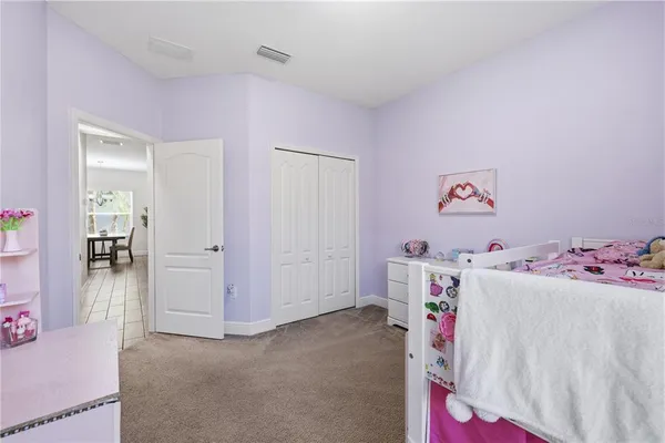 a room with a bed and closet