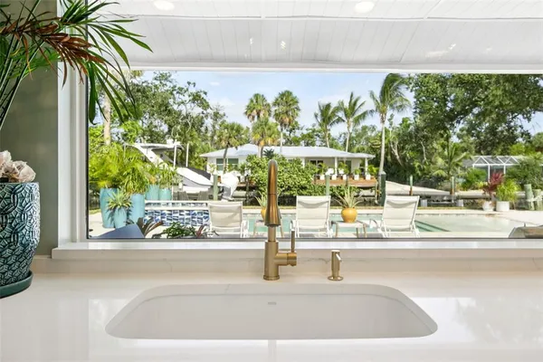 a view of a swimming pool with a patio
