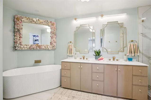 a bathroom with a double vanity sink and mirror