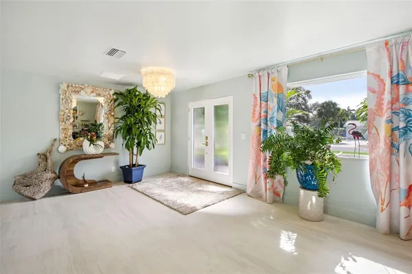 a view of a lobby with a potted plant