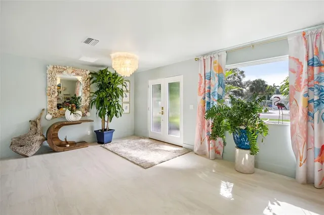 a view of a lobby with a potted plant