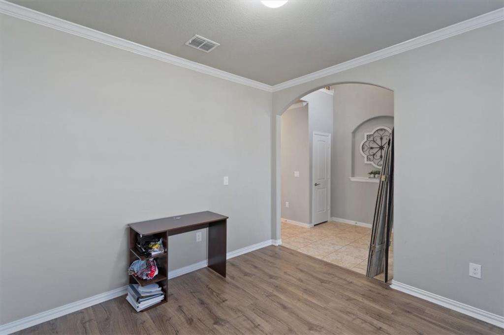 12311 Altamira Street Austin, TX 78748 - Photo 19 of 36 a view of room with wooden floor