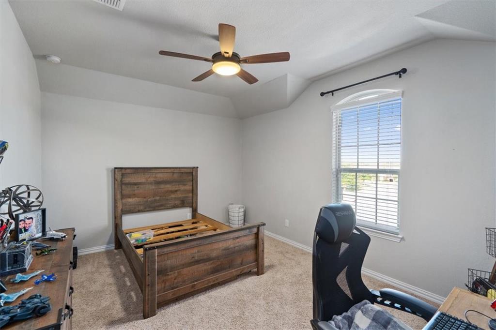 12311 Altamira Street Austin, TX 78748 - Photo 25 of 36 a living room with furniture and a window