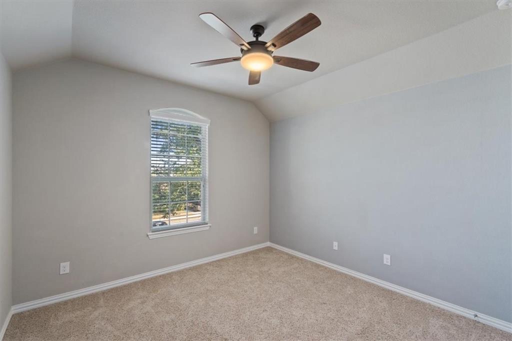 12311 Altamira Street Austin, TX 78748 - Photo 28 of 36 an empty room with a window and a fan