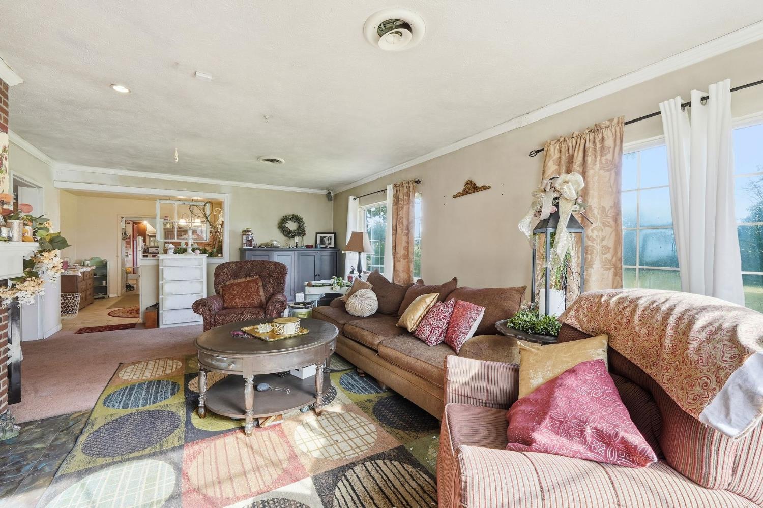 7801 El Modena Avenue Elverta, CA 95626 - Photo 17 of 51 a living room with furniture rug and wooden floor