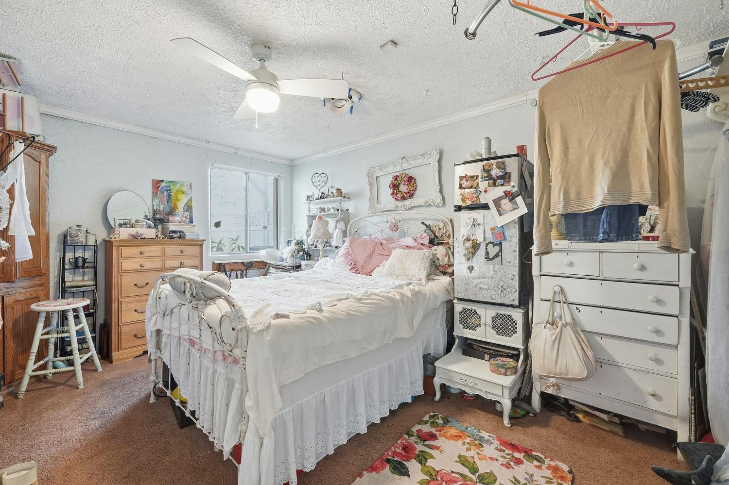 7801 El Modena Avenue Elverta, CA 95626 - Photo 23 of 51 a bedroom with a bed and a window