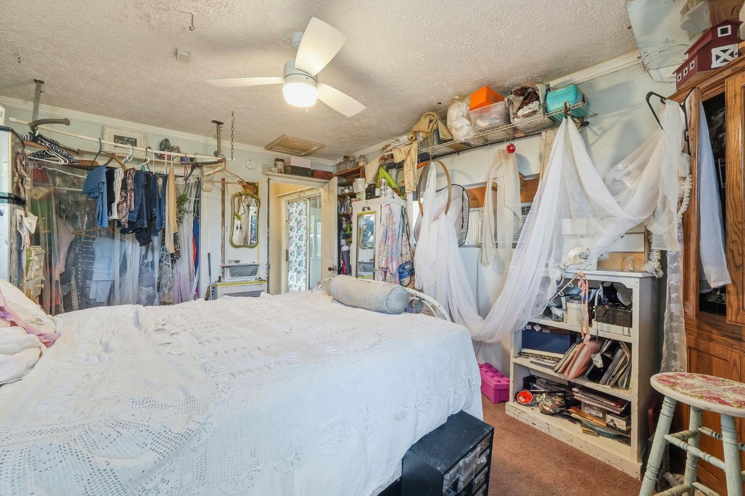 7801 El Modena Avenue Elverta, CA 95626 - Photo 25 of 51 a bed room with a bed and a walk in closet