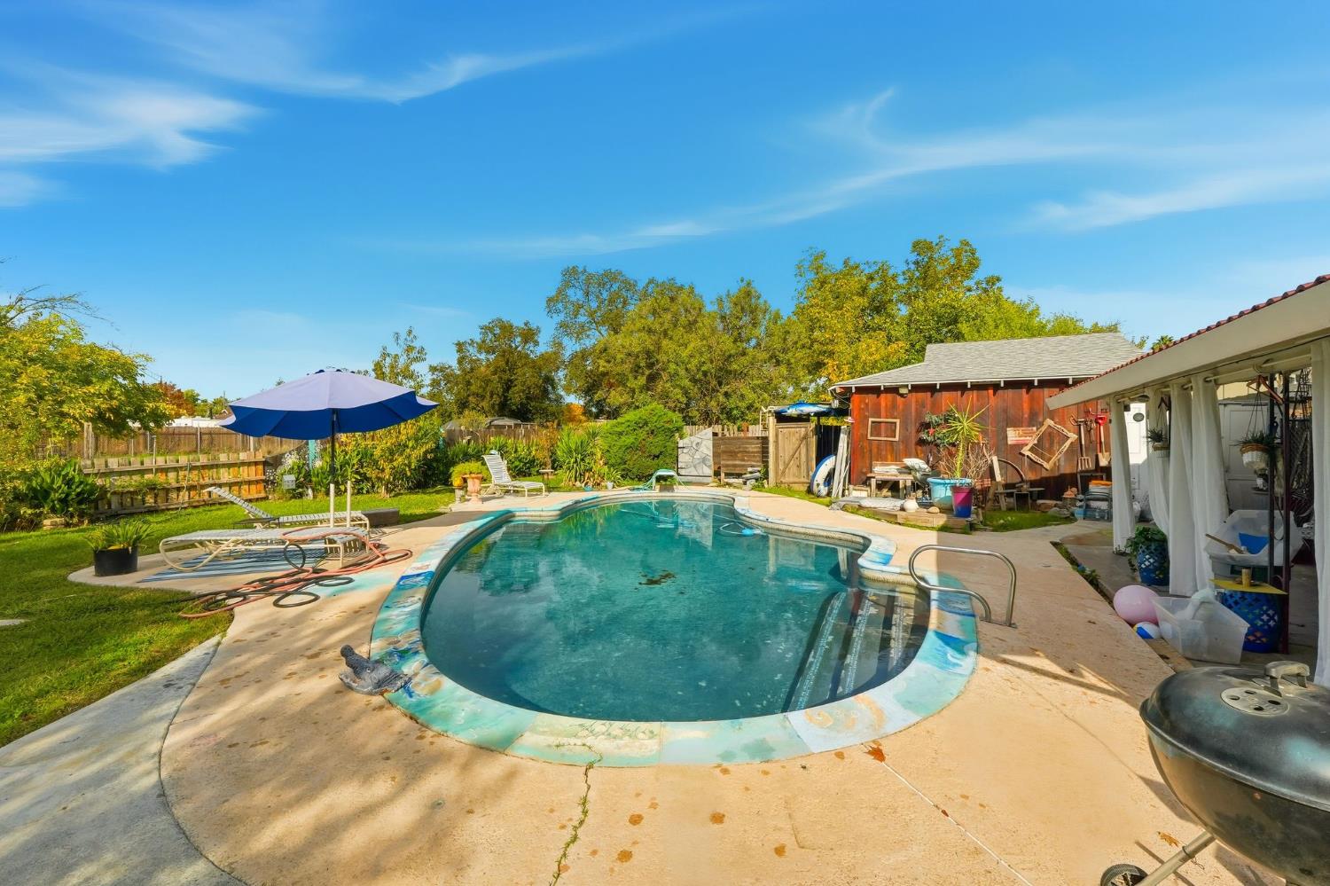7801 El Modena Avenue Elverta, CA 95626 - Photo 36 of 51 a view of a swimming pool with a patio