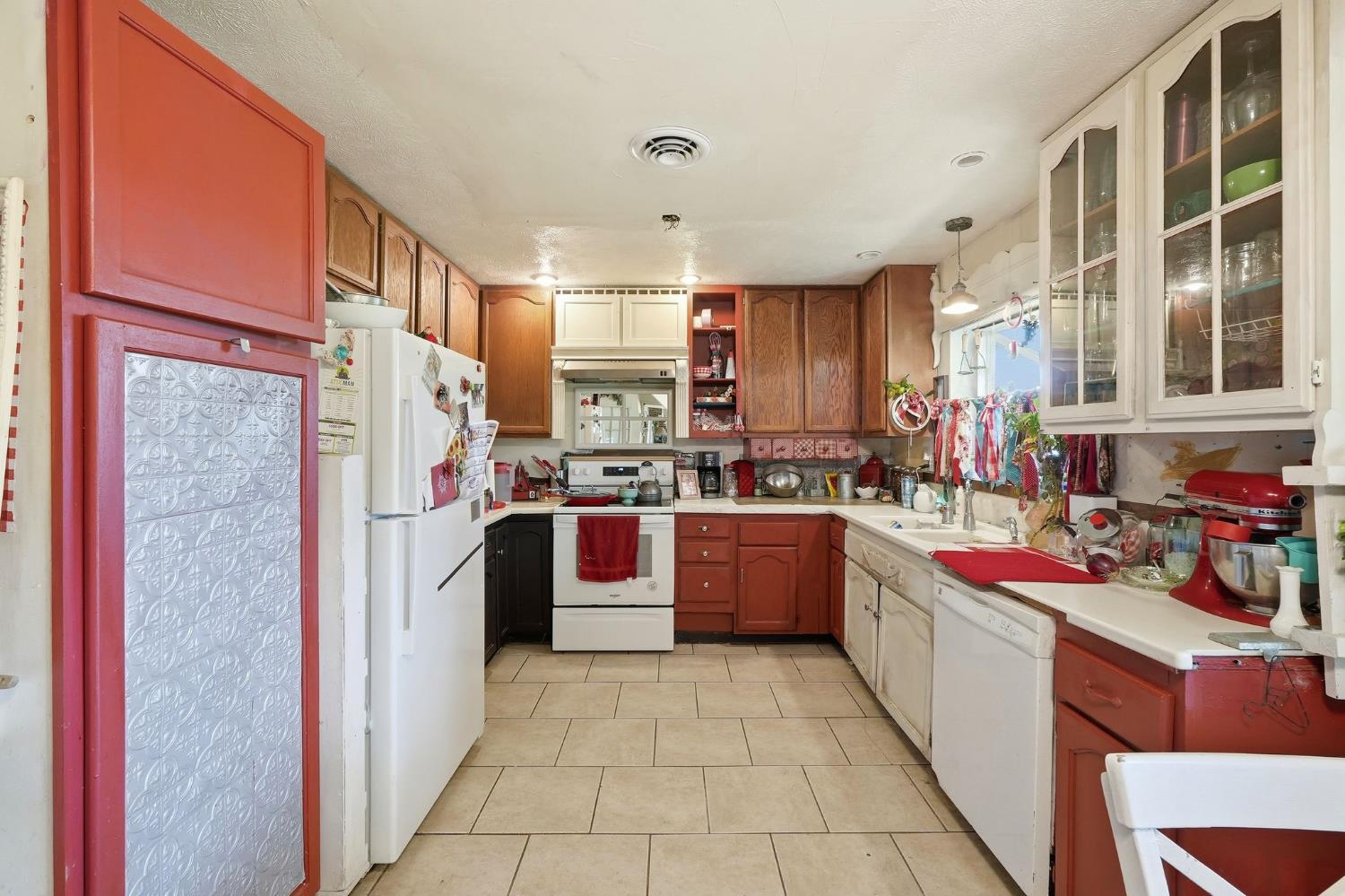 7801 El Modena Avenue Elverta, CA 95626 - Photo 10 of 51 a kitchen with stainless steel appliances granite countertop a refrigerator and a stove