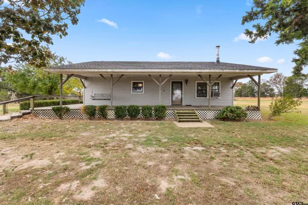 a front view of house with yard