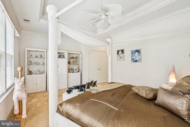 a bed room with a bed and a couch