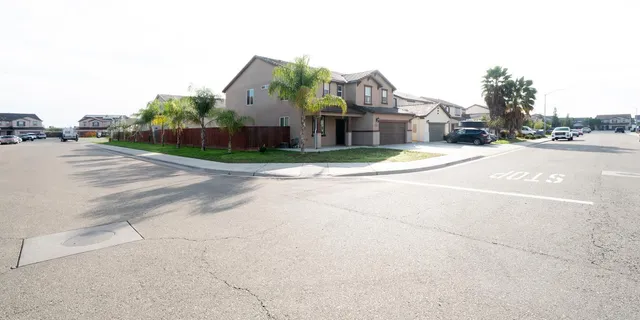 a view of a city street and a building