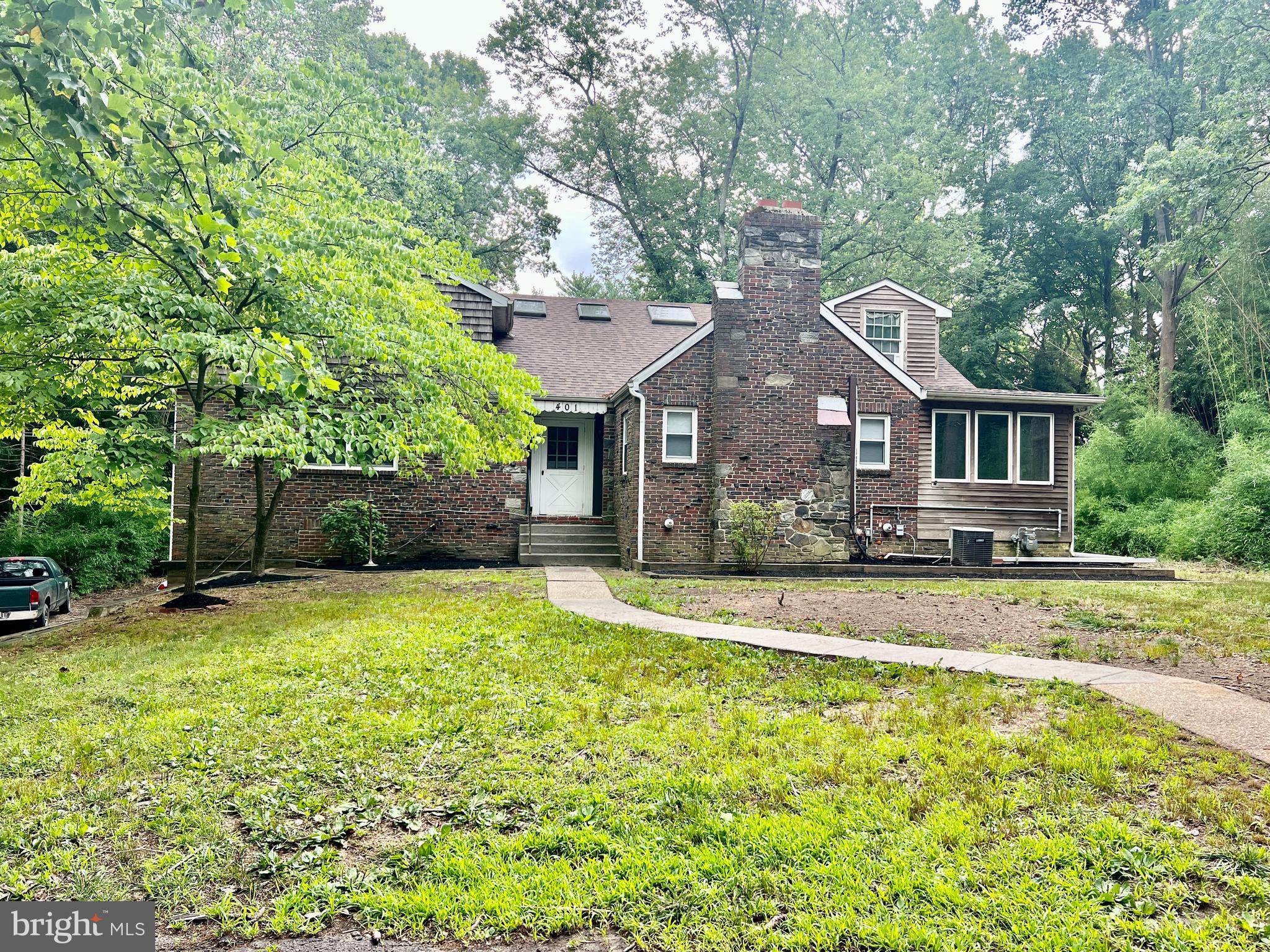 front view of a house with a yard