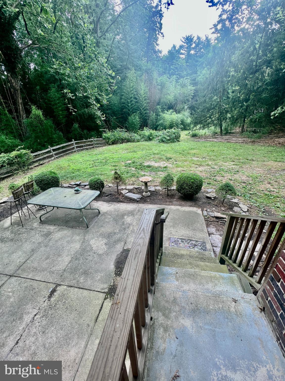 401 Bethel Mill Road, Unit A Pitman, NJ 08071 - Photo 16 of 18 a view of a backyard with a garden and entertaining space