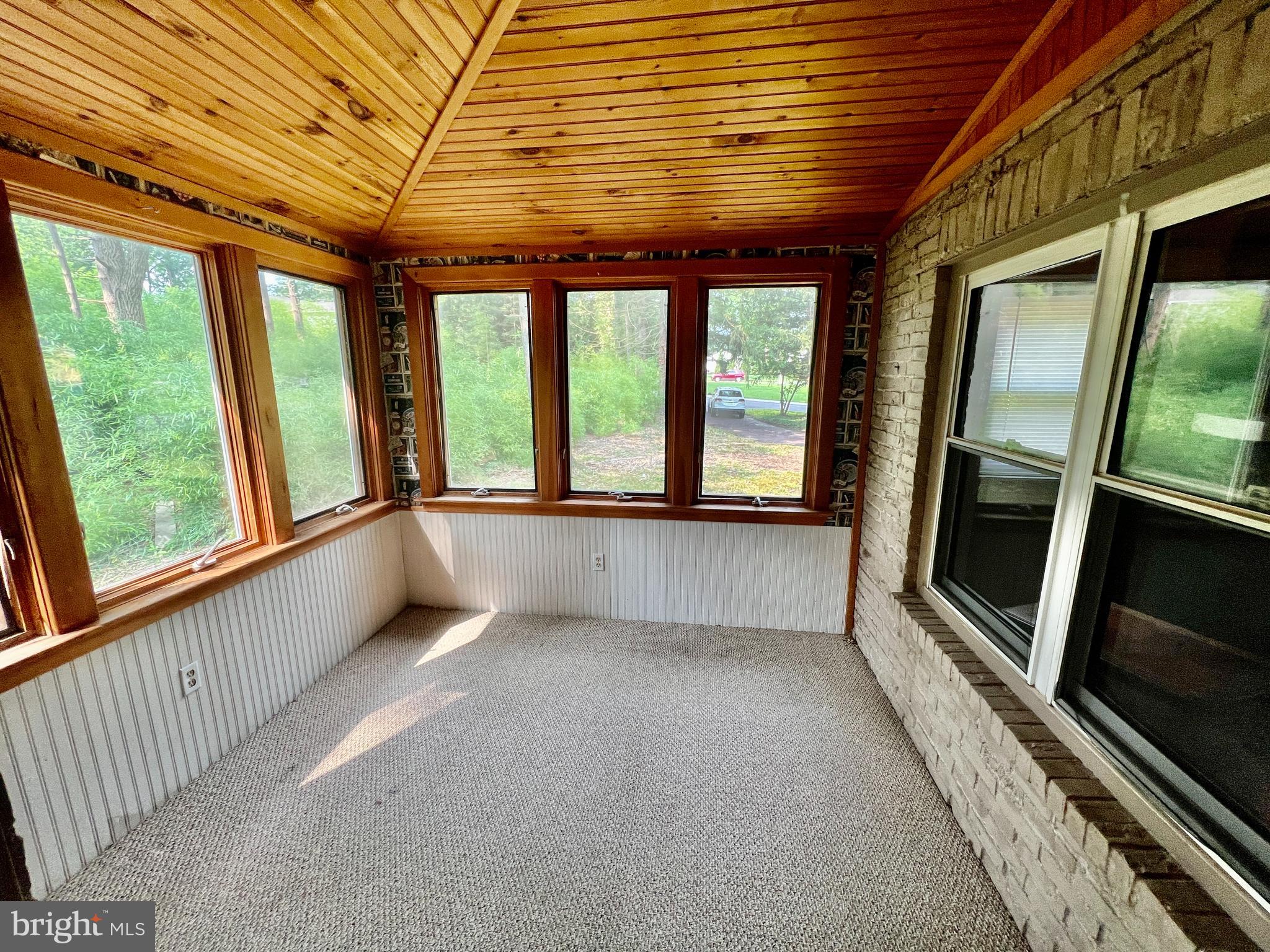 401 Bethel Mill Road, Unit A Pitman, NJ 08071 - Photo 5 of 18 a view of an empty room with a window