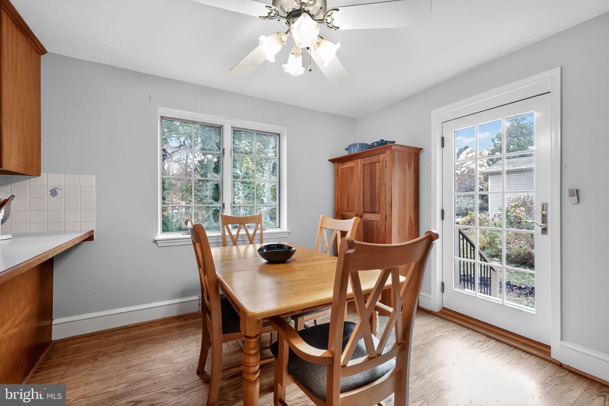 240 Hopkins Avenue Haddonfield, NJ 08033 - Photo 13 of 36 a view of a dining room with furniture window and wooden floor