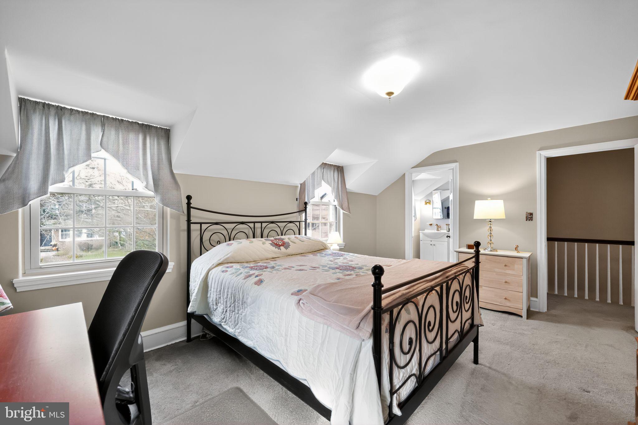 240 Hopkins Avenue Haddonfield, NJ 08033 - Photo 16 of 36 a bedroom with a bed and a window