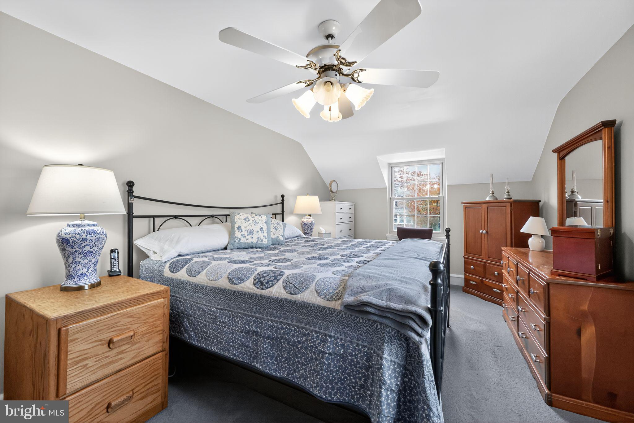 240 Hopkins Avenue Haddonfield, NJ 08033 - Photo 19 of 36 a bedroom with bed and window