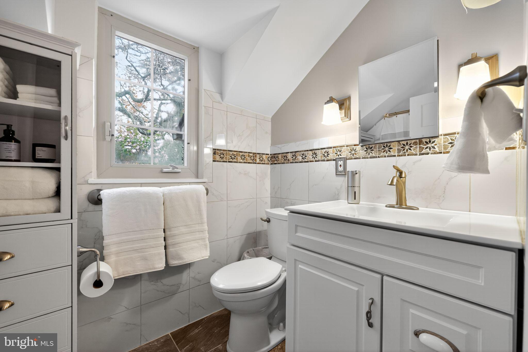 240 Hopkins Avenue Haddonfield, NJ 08033 - Photo 23 of 36 a bathroom with a sink toilet and shower