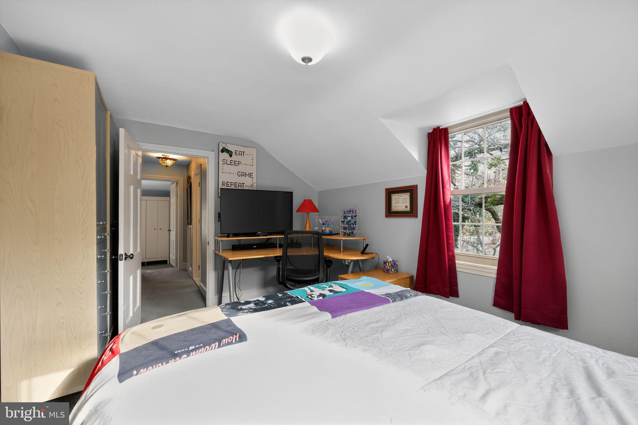 240 Hopkins Avenue Haddonfield, NJ 08033 - Photo 26 of 36 a bedroom with a bed and a flat screen tv